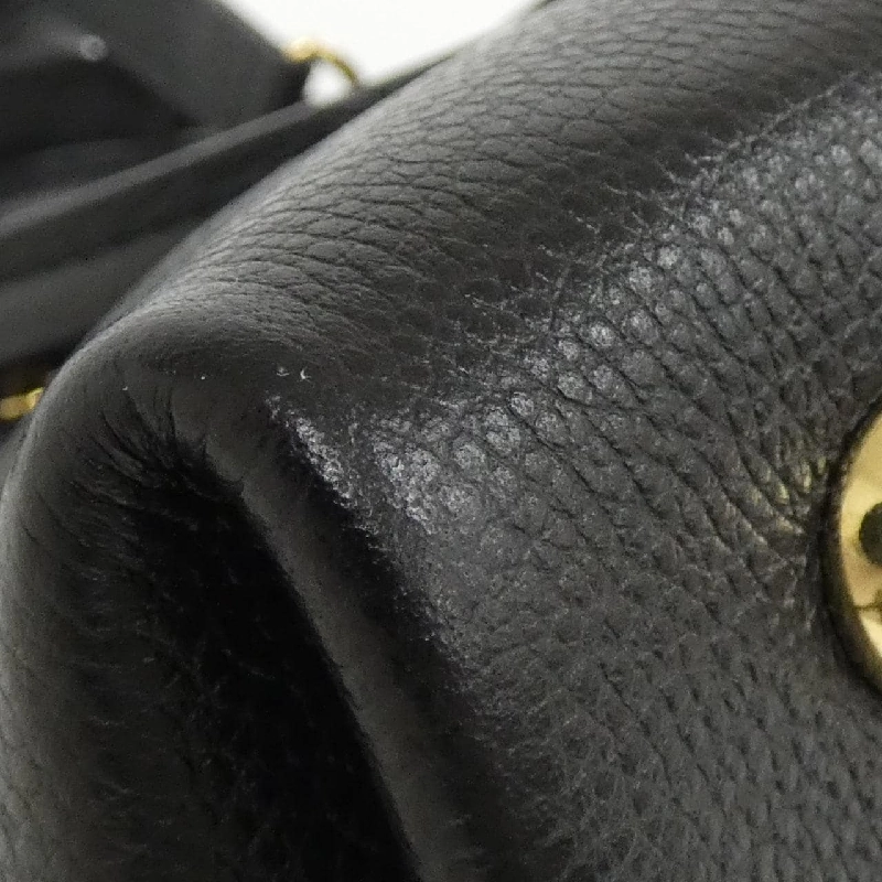 Túi Louis Vuitton Monogram Empreinte Neo Alma BB M44829 614383