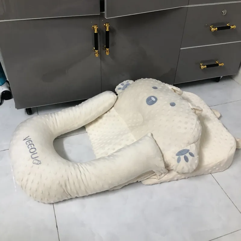 Gối chống giật mình và hỗ trợ giấc ngủ cho trẻ sơ sinh Veeou 974328