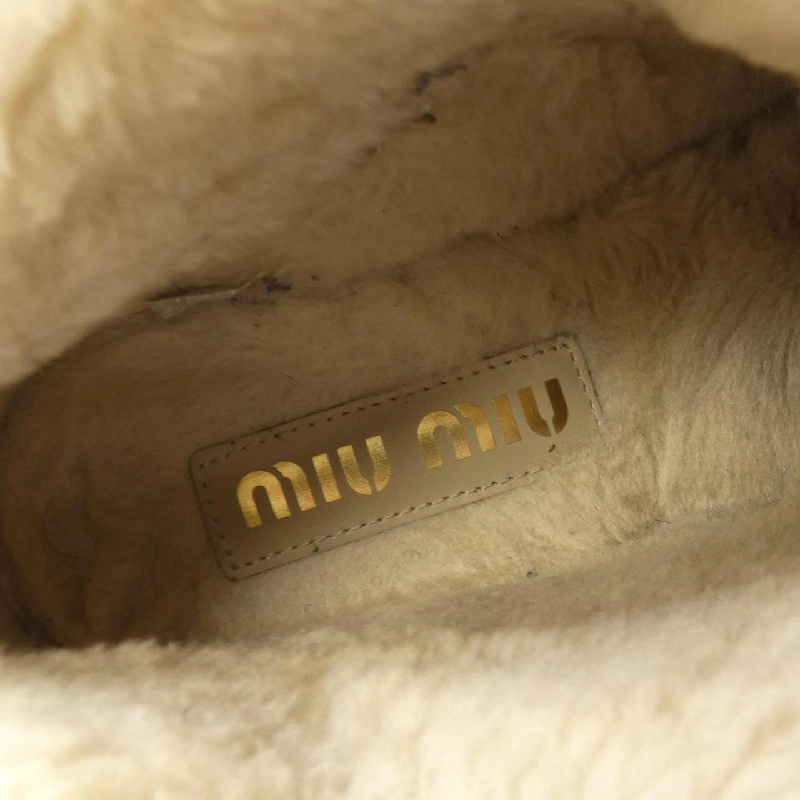Giày bốt MIU MIU 662386