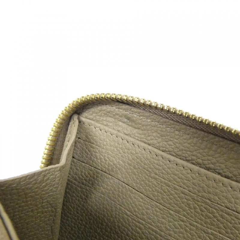 Ví Zippy Monogram Empreinte Hai Màu Louis Vuitton M69794 621904