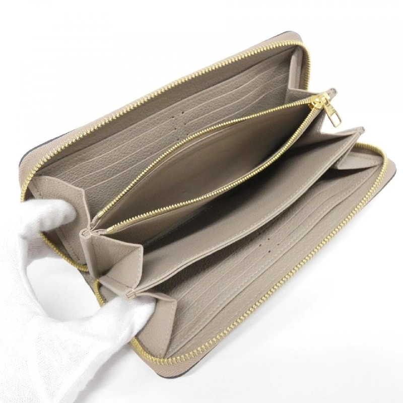 Ví Zippy Monogram Empreinte Hai Màu Louis Vuitton M69794 621201