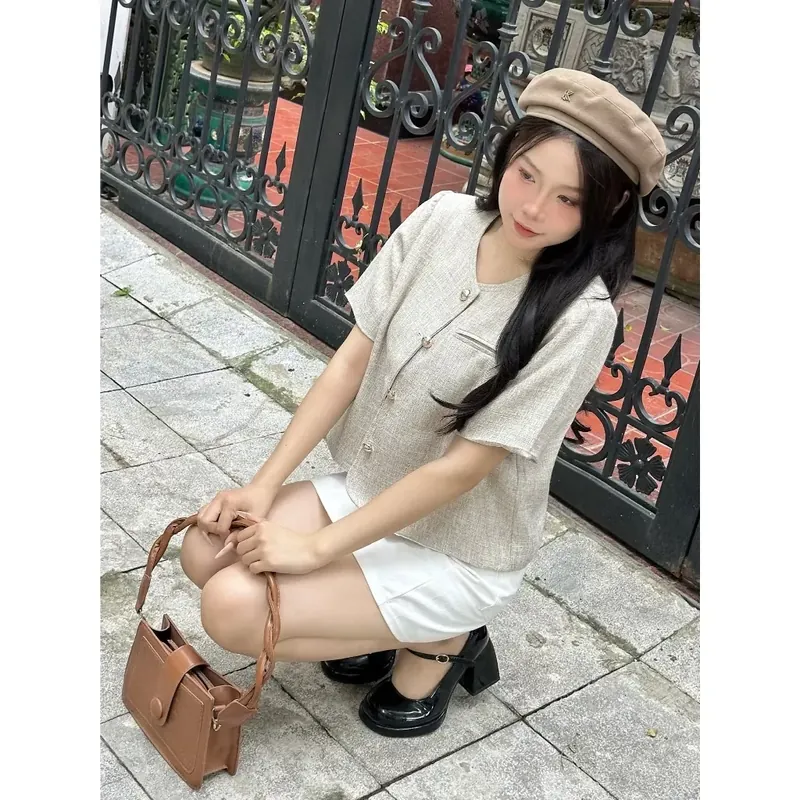 Áo blazer cổ tròn nữ cộc tay họa tiết túi 605088