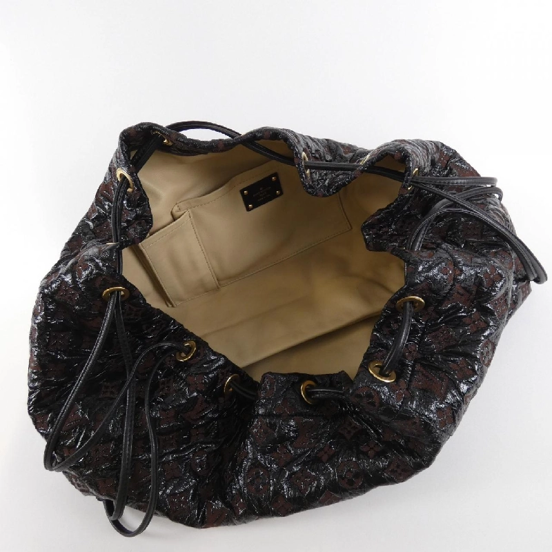 Túi xách vai Louis Vuitton Monogram Elvinil Squeech M95259 611392