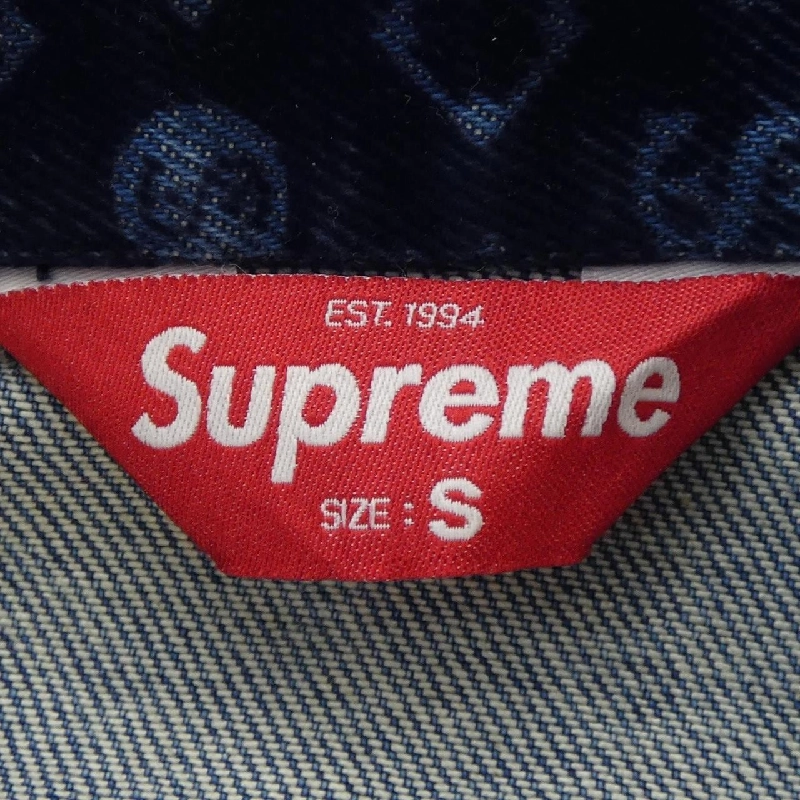Áo khoác denim FLOCKED DENIM TRUCKER của SUPREME - Hàng hiệu Authentic 888215