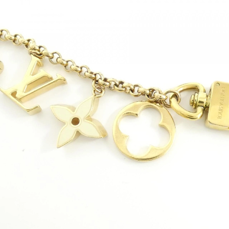 Móc chìa khóa Louis Vuitton Charm Chain Fleur De Monogram M65111 623821