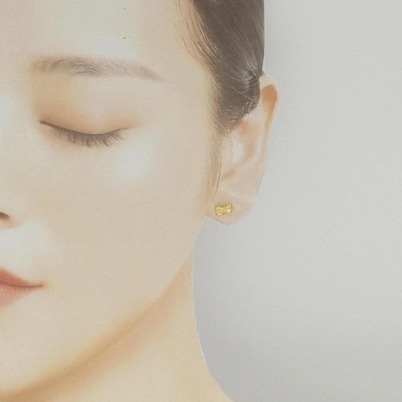 K18YG Bông tai kim cương hình ruy băng - Hàng hiệu Chính hãng 877400