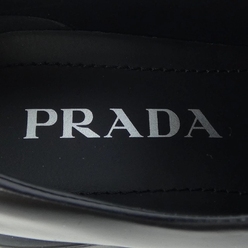 Giày lười Monolis Triangle Logo PRADA 1D649M - Hàng hiệu Authentic 827971