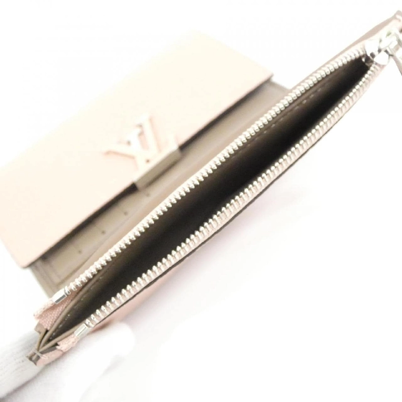 Ví Louis Vuitton Trillon Portefeuille Capucines Compact M62156 622216