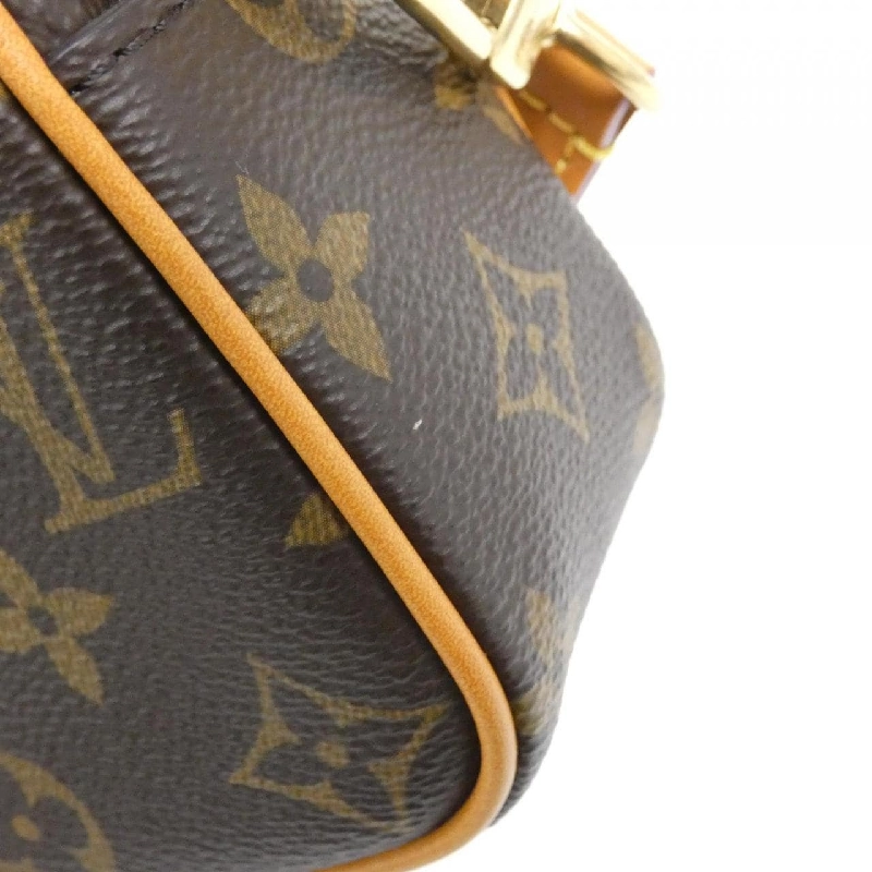 Túi đeo vai Louis Vuitton Monogram Archive Trocadéro Wearable Wallet M14058 609523