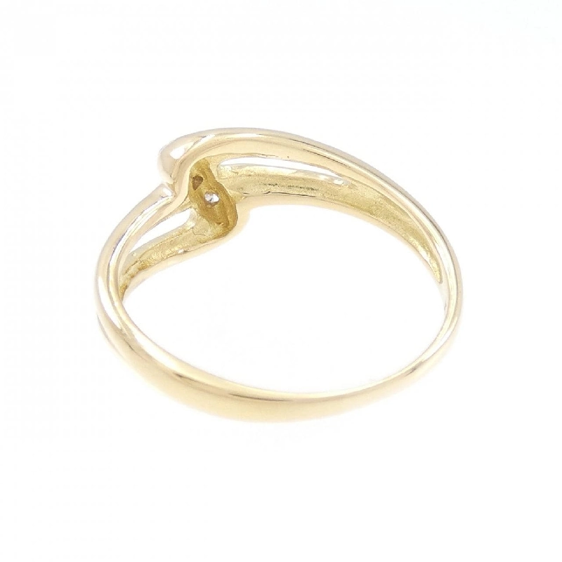 Nhẫn kim cương ba viên K18YG 0.03CT 673083