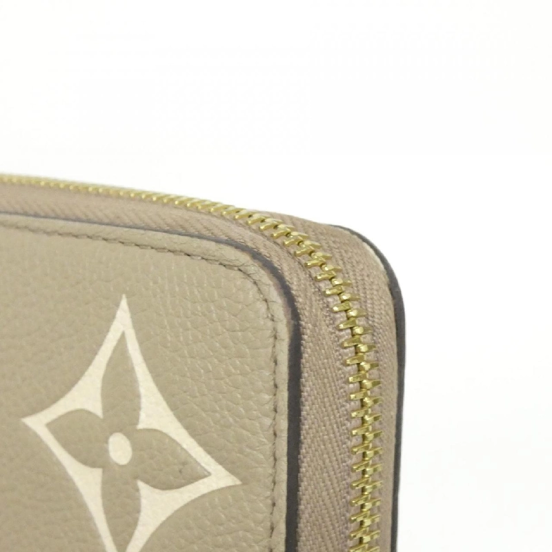 Ví Zippy Monogram Empreinte Hai Màu Louis Vuitton M69794 621904