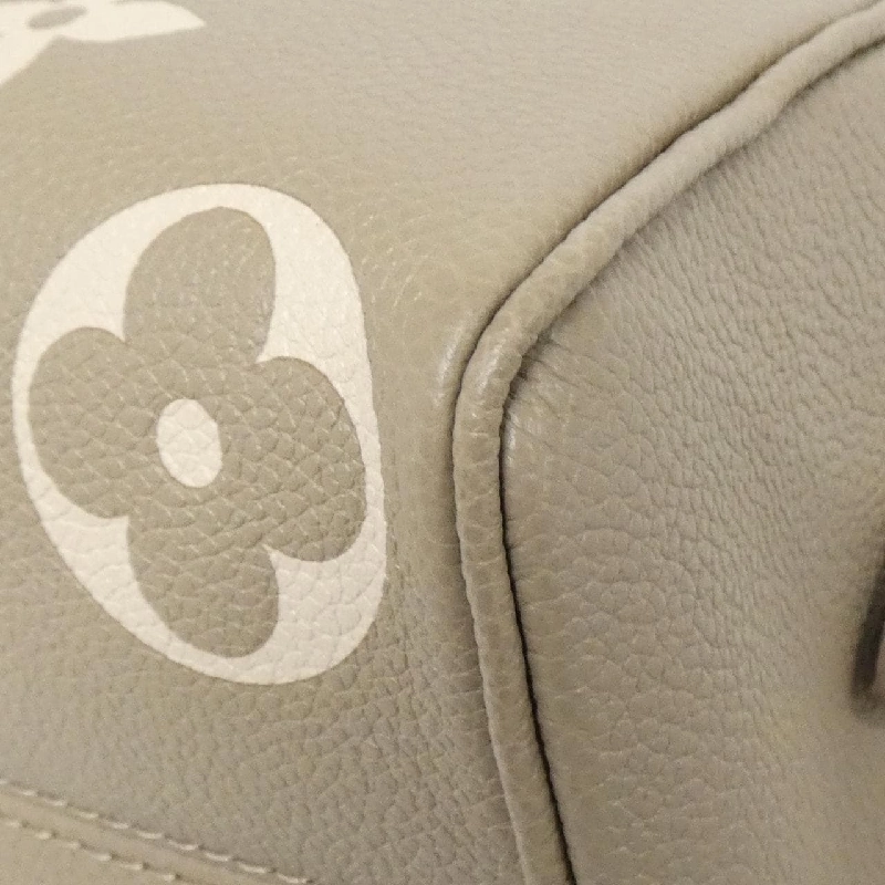 Túi xách Boston Louis Vuitton Monogram Bicolor Empreinte Speedy Bandoulière 20cm M46575 614202