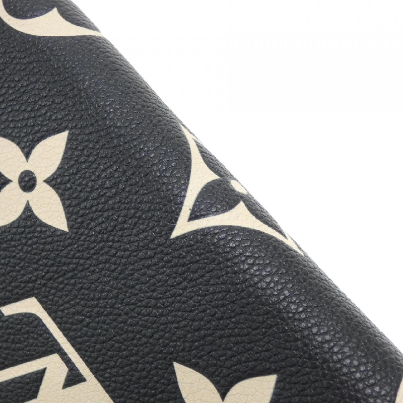 Ví Zippy Monogram Empreinte Hai Màu Louis Vuitton M80481 621798