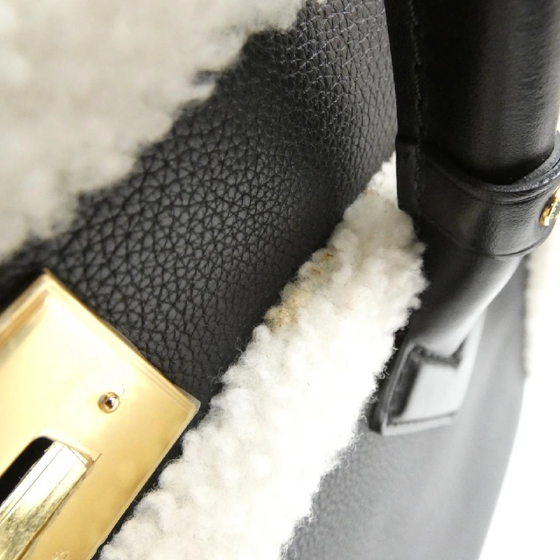 Túi Louis Vuitton On My Side MM M58908 616955