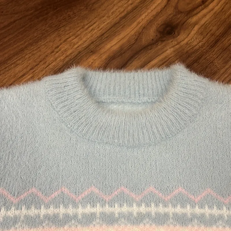 Áo len lông bé gái CN size 140 màu xanh nhạt ít mặc 689516