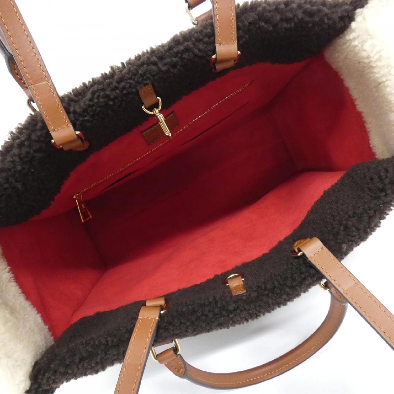 Túi Louis Vuitton Monogram Teddy On The Go GM M55420 615867