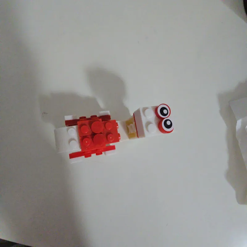 Mô hình lắp ghép khủng long cổ dài mini đỏ trắng 960829