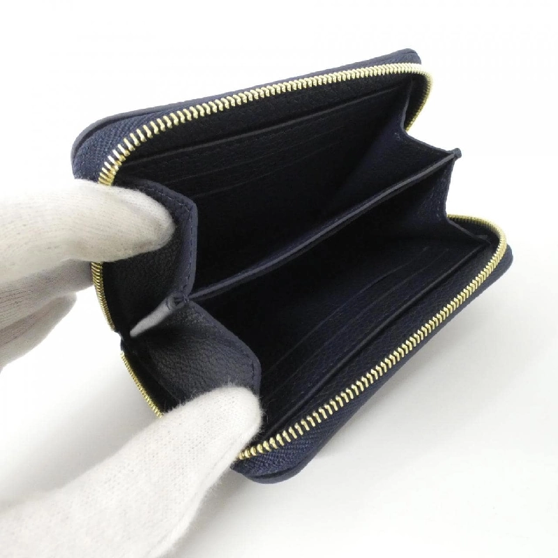 Ví tiền xu Louis Vuitton hai màu Monogram Empreinte Zippy M83606 - Hàng hiệu Authentic 806234