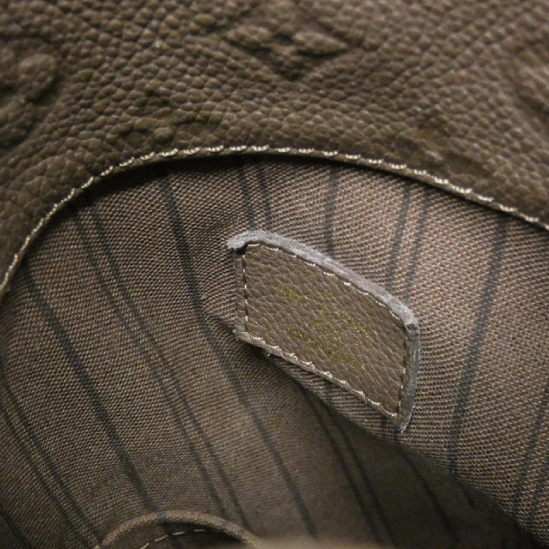 Túi xách vai Louis Vuitton Monogram Empreinte Artsy MM M93447 613485