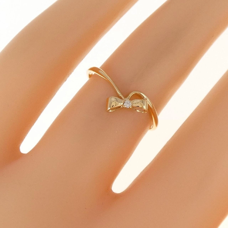 Nhẫn kim cương K18YG hình ruy băng 671760