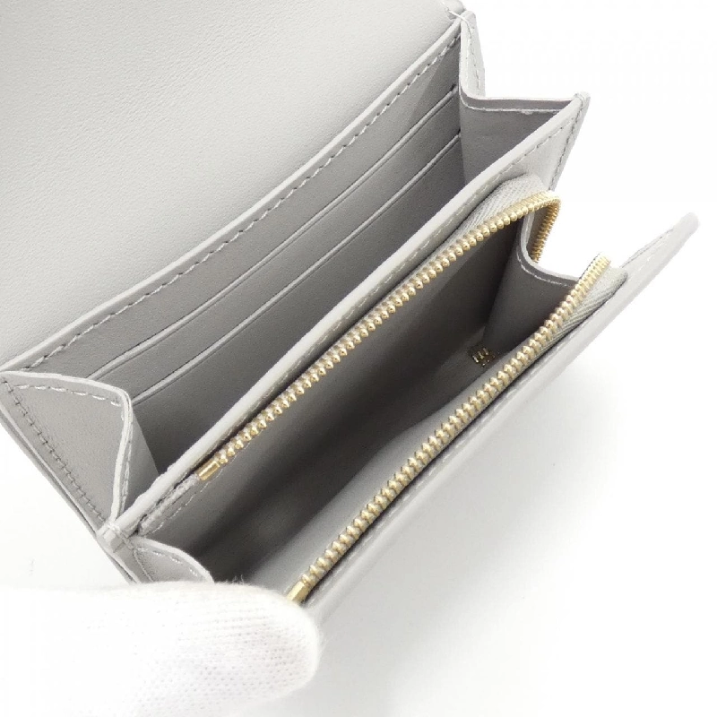 Ví Louis Vuitton Portefoy Capucines Tiny M12406 622809