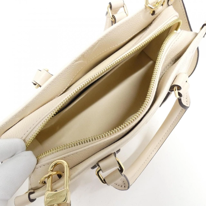 Túi Louis Vuitton Monogram Empreinte OnTheGoEW M23698 618322