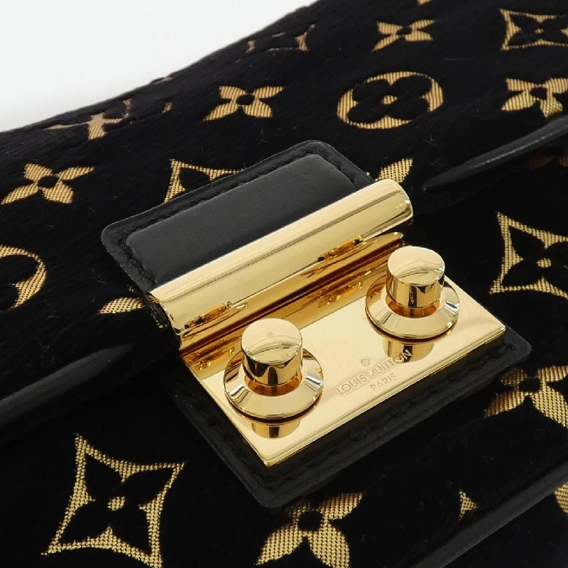 Túi xách vai Louis Vuitton Monogram Motard Pochette Cari M93131 611942