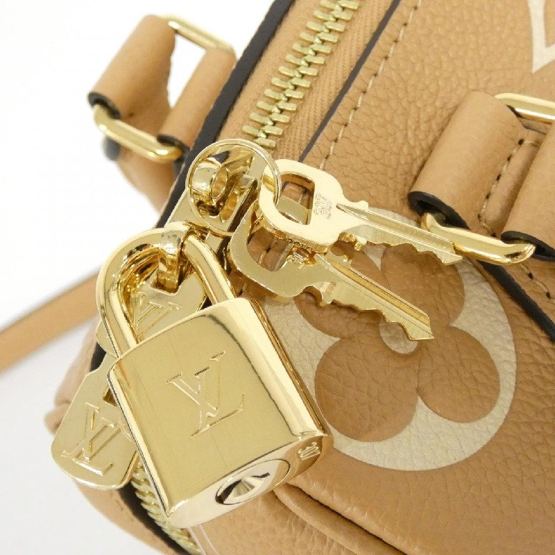 Túi xách Boston Louis Vuitton Monogram Bicolor Empreinte Speedy Bandoulière M12713 613955