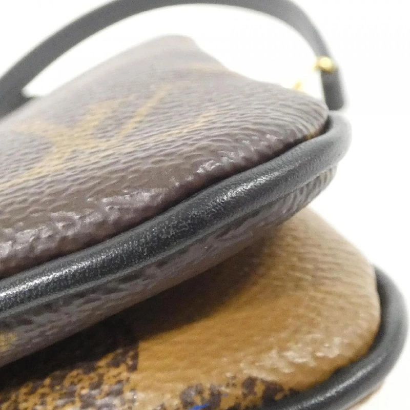 Túi xách đeo vai Louis Vuitton Monogram Giant Pochette Double Zip M69203 612744