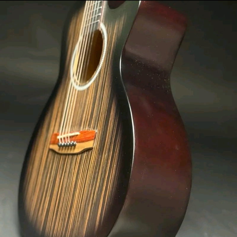 Đàn guitar bằng gỗ (có tặng kèm thêm kẹp đàn và phím gãy đàn) 545611