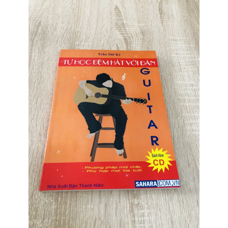TỰ HỌC ĐỆM HÁT VỚI ĐÀN GUITAR ( kèm đĩa CD) 975833