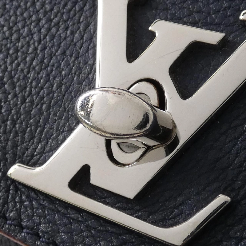 Ba lô Louis Vuitton Lockme M43879 610368