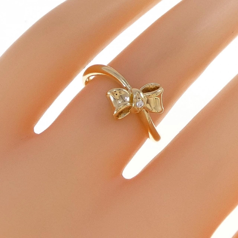 Nhẫn kim cương K18YG hình ruy băng 0.006CT 669329