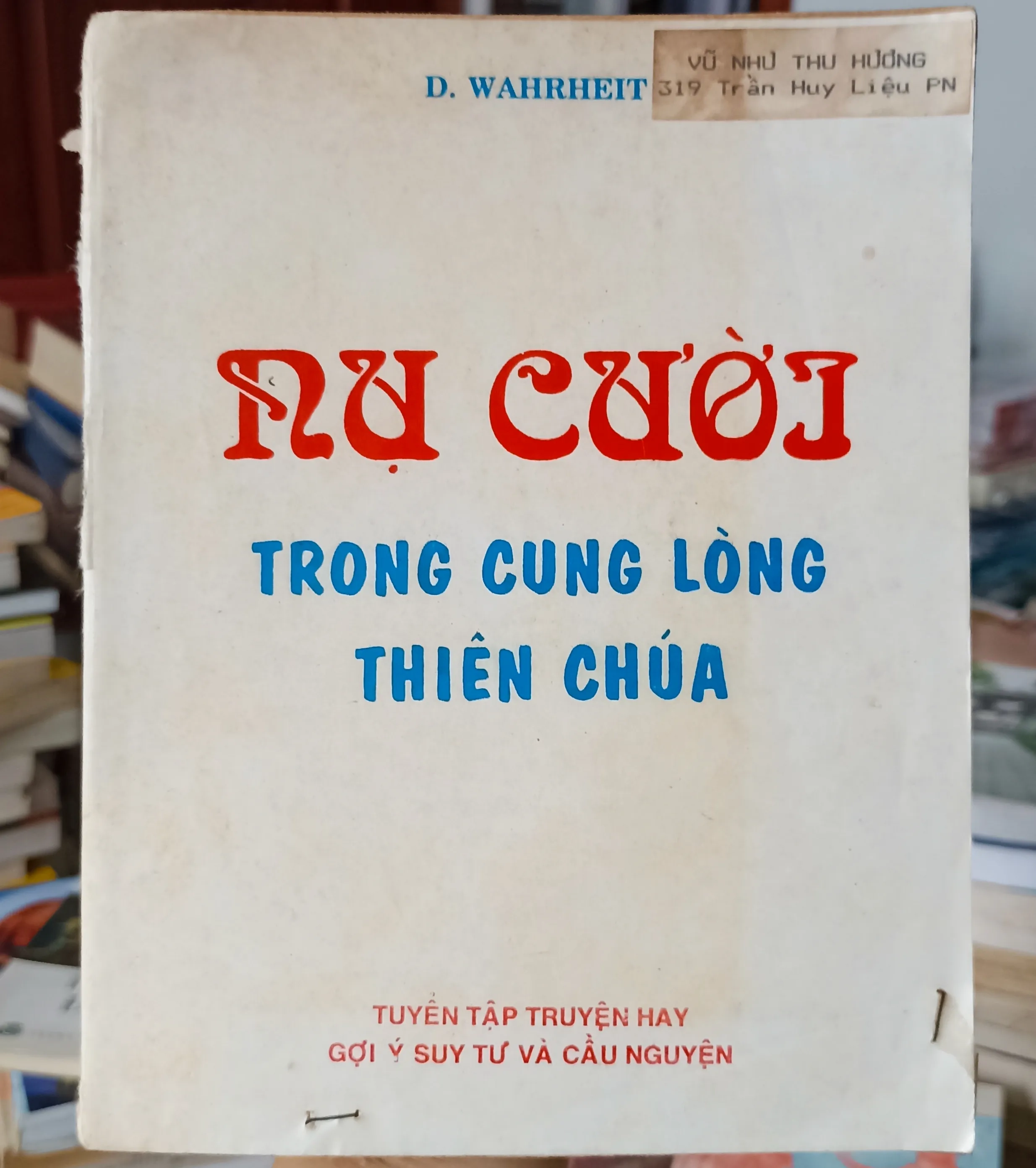Nụ cười trong cung lòng Thiên Chúa 🌻 by  - Sách Book Cover - Ngọc Hiển Books