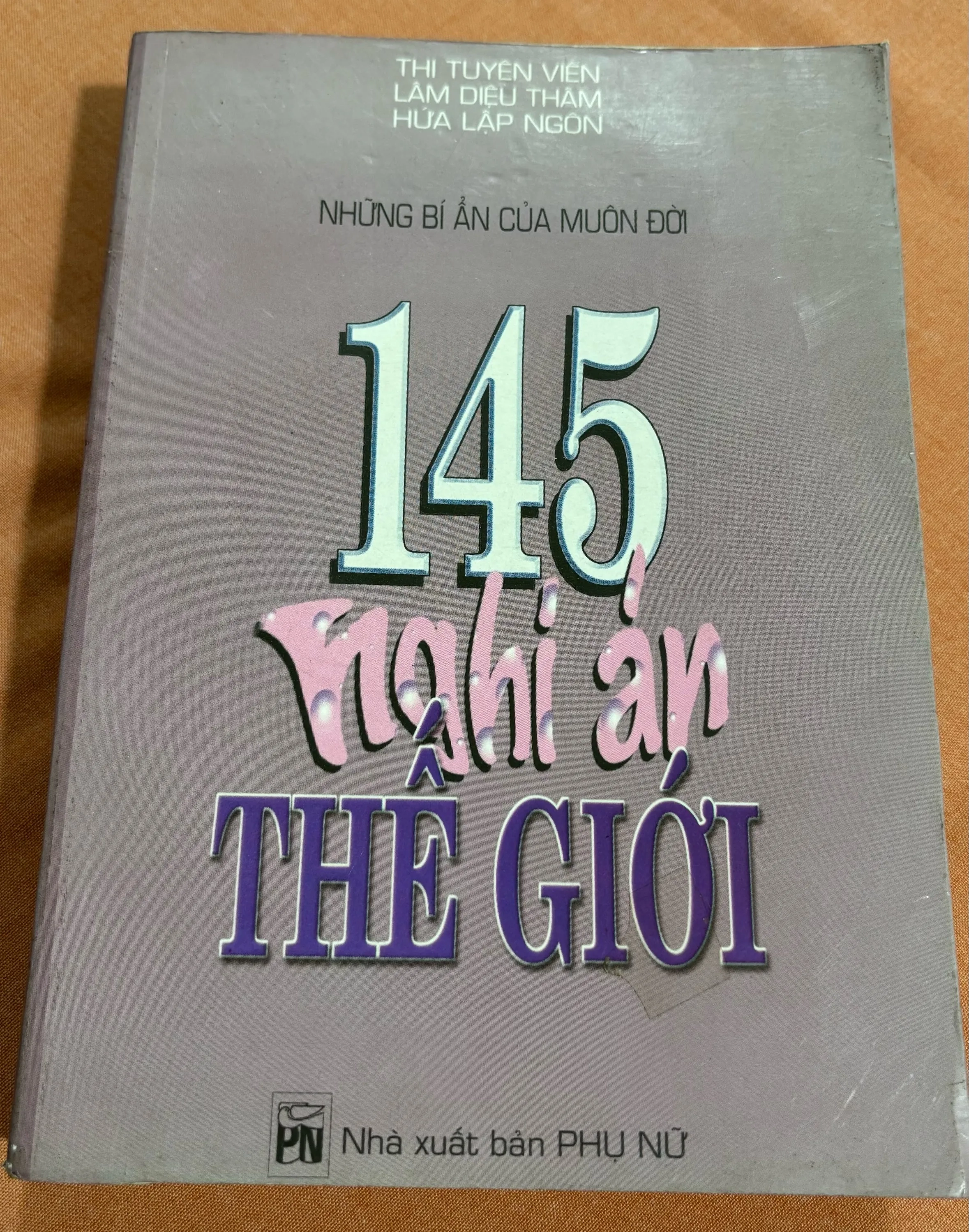 145 nghi án thế giới 🌊 by  - Sách Book Cover - Ngọc Hiển Books