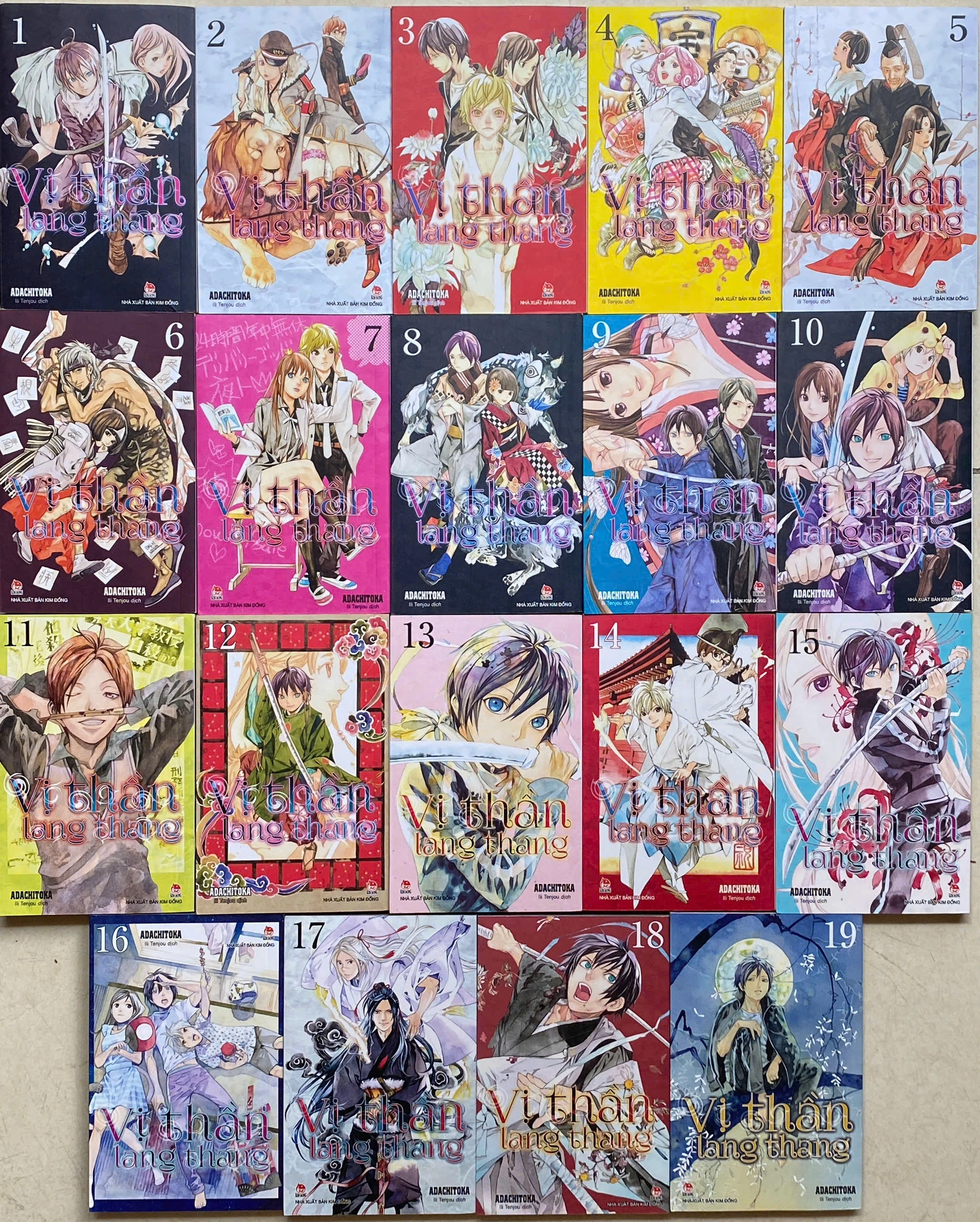 Vị Thần Lang Thang - Tập 1- 19 by Adachitoka - Sách Book Cover - Ngọc Hiển Books