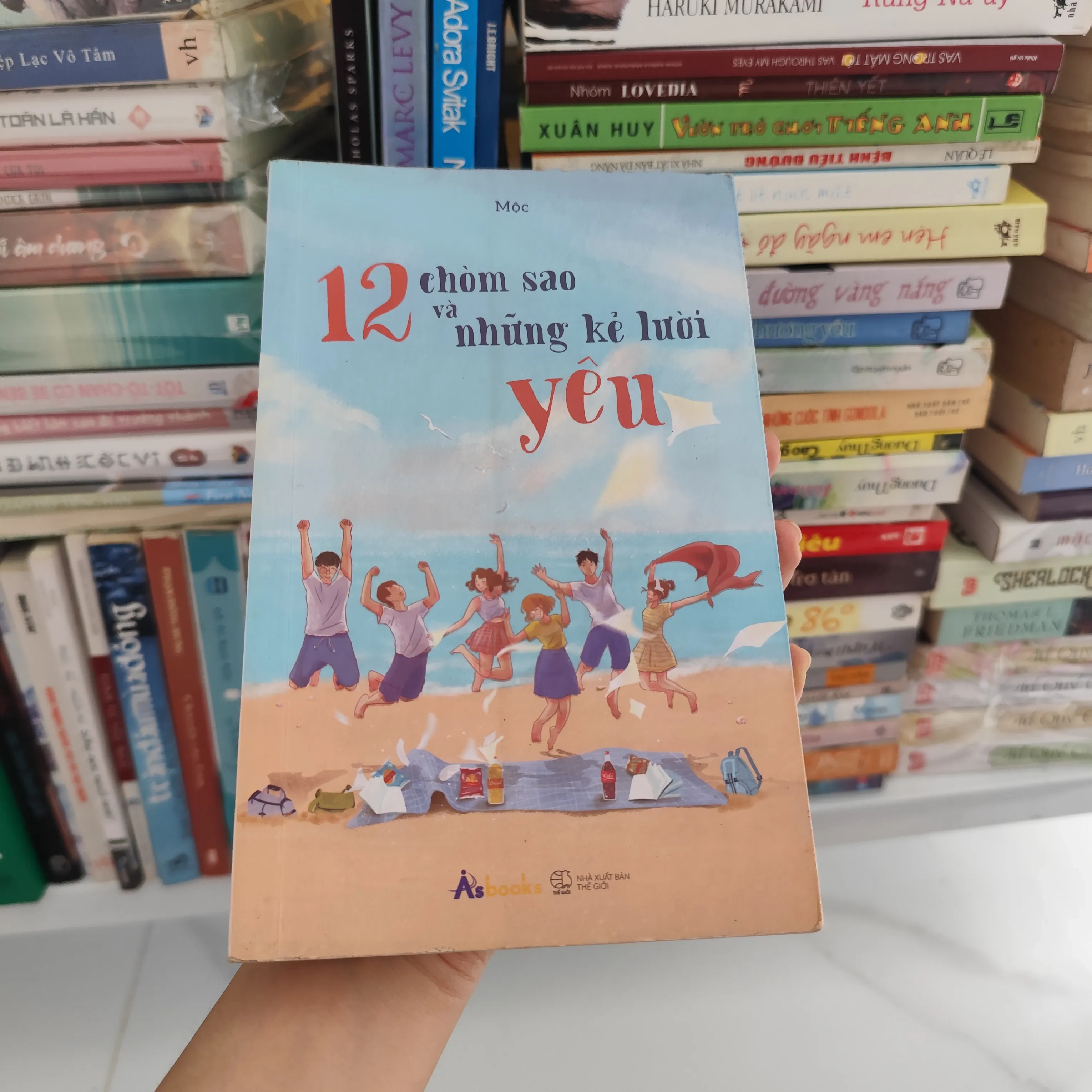 12 chòm sao và những kẻ lười yêu by  - Sách Book Cover - Ngọc Hiển Books