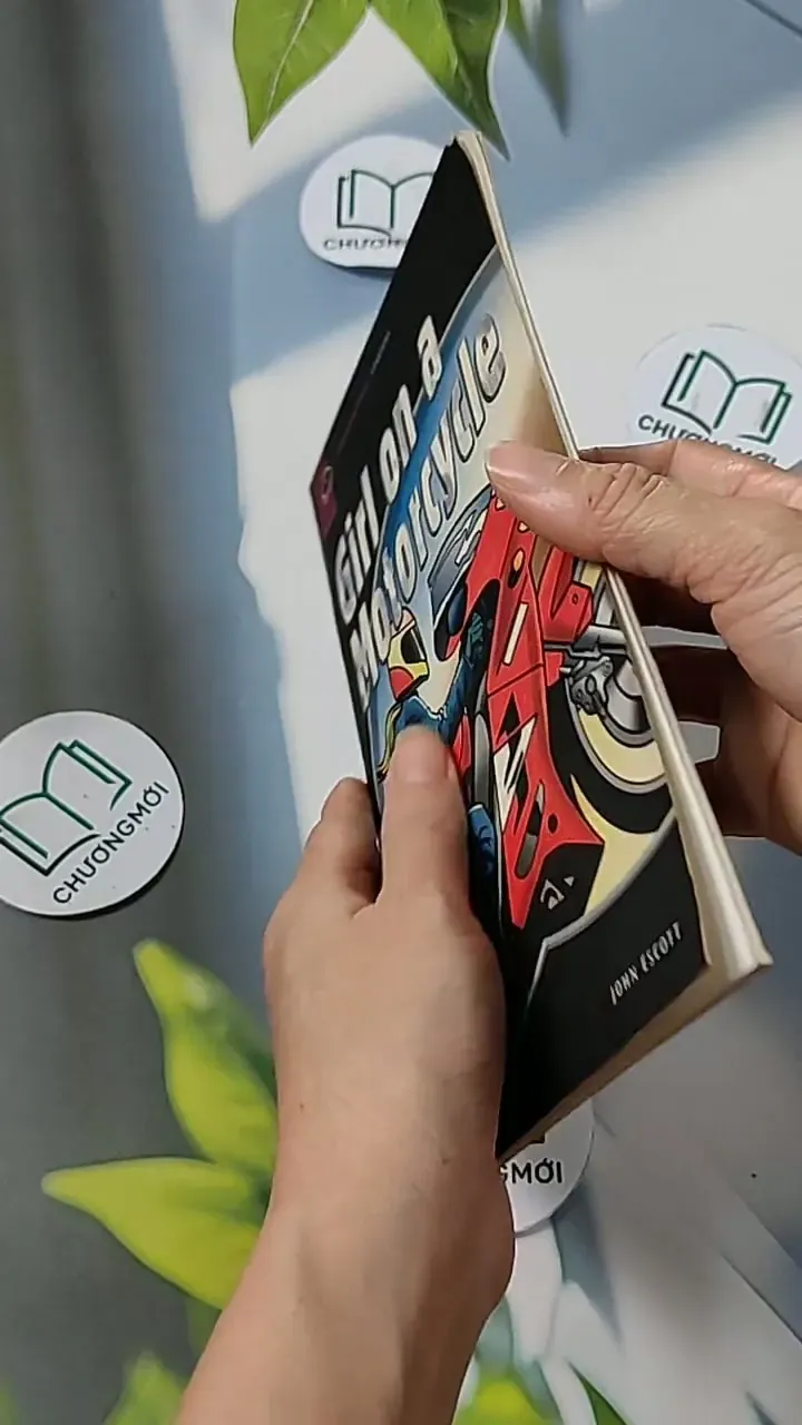 Girl on a Motorcycle  - John Escott  703124