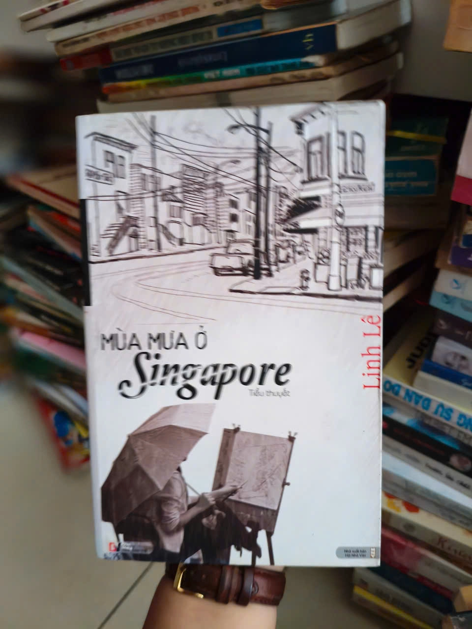 Mùa Mưa Ở Singapore by  - Sách Book Cover - Ngọc Hiển Books