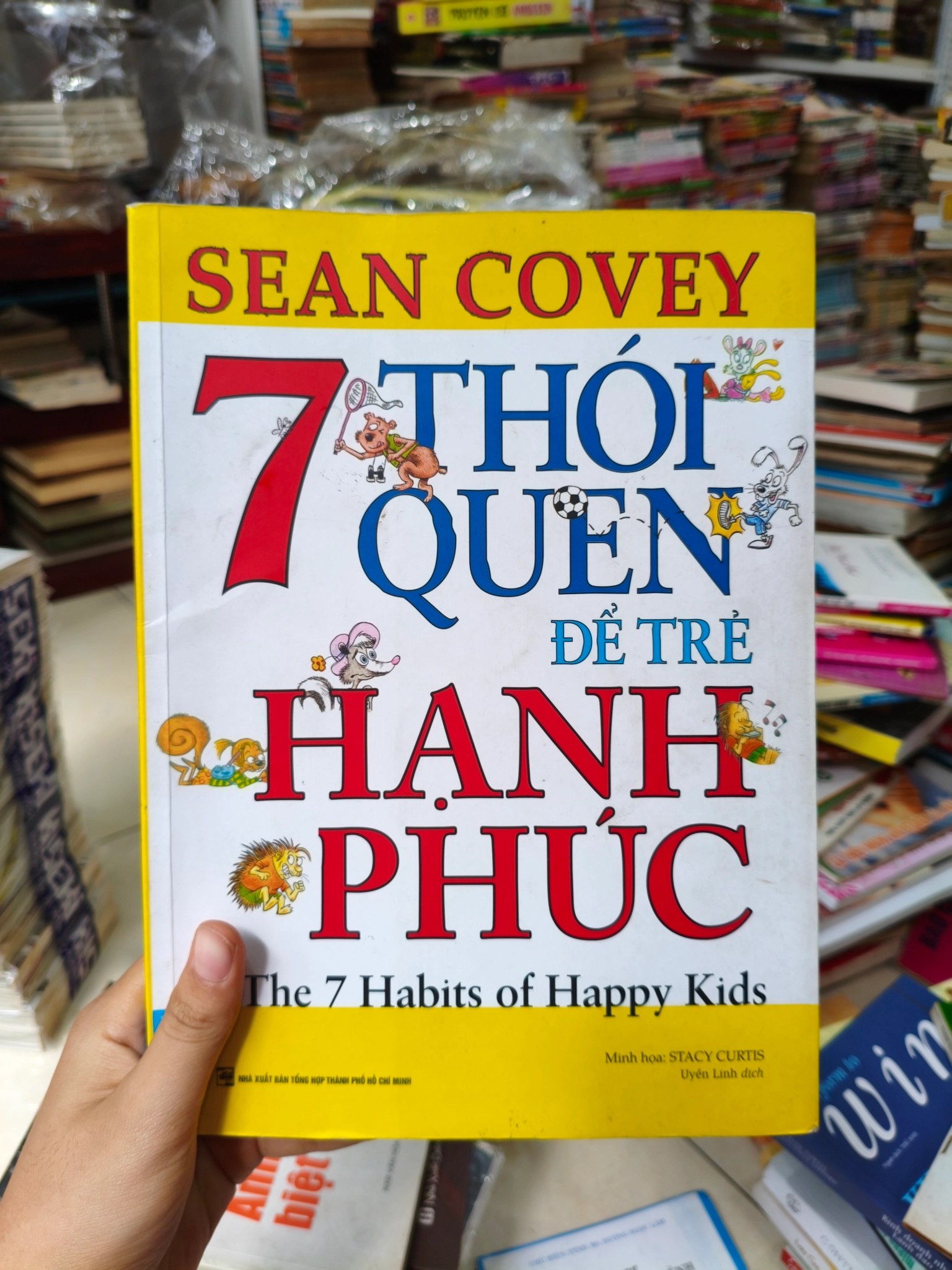 ,7 thói quen để trẻ hạnh phúc 🌱 by  - Sách Book Cover - Ngọc Hiển Books