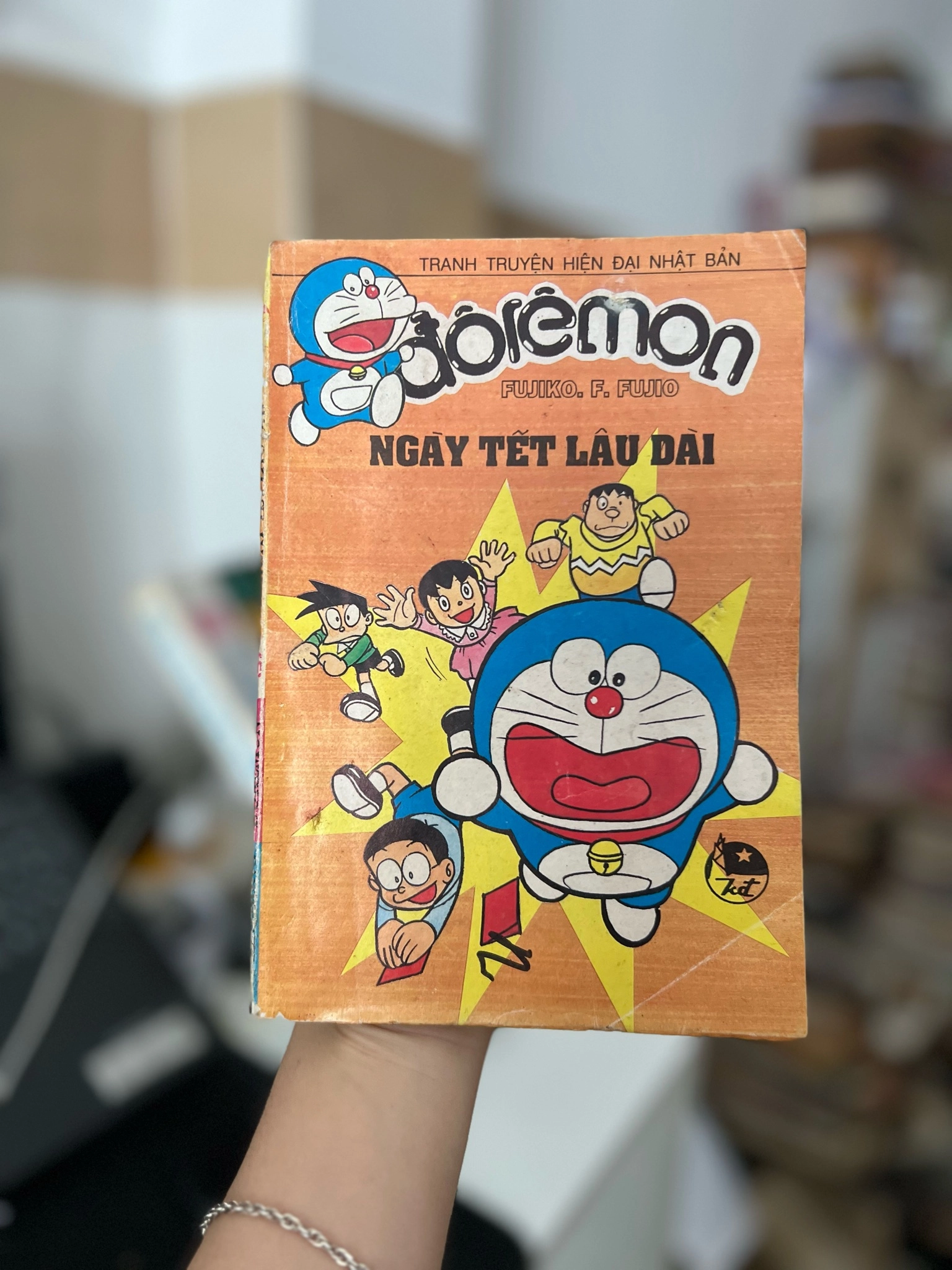 Doremon 9x - ngày tết lâu dài by  - Sách Book Cover - Ngọc Hiển Books
