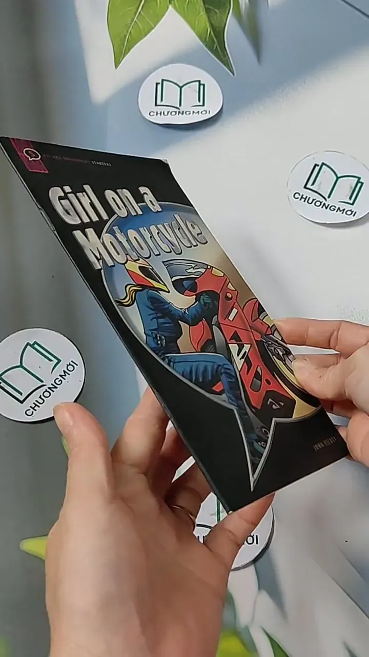 Girl on a Motorcycle  - John Escott  703124