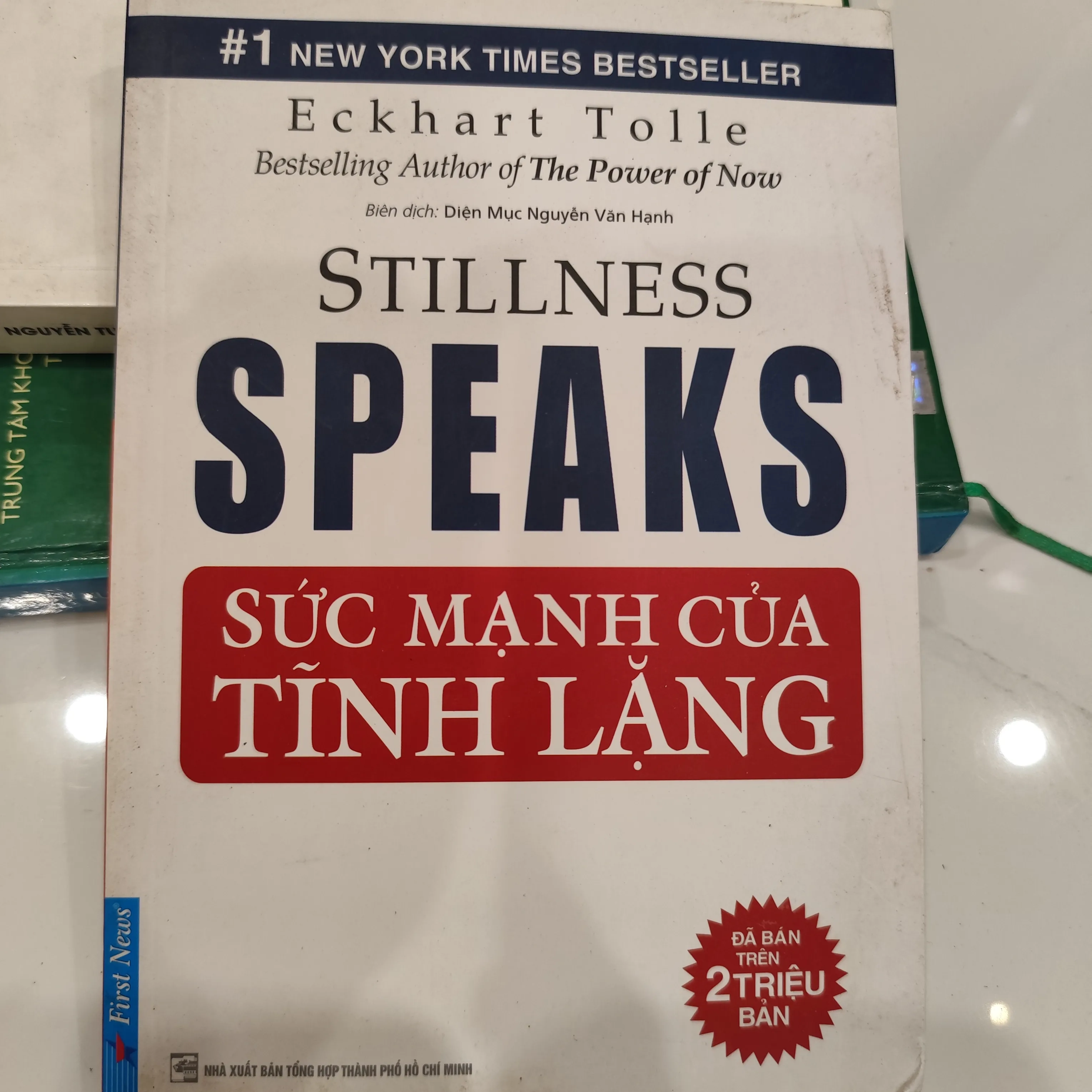 Sức mạnh của tĩnh lặng" (tên gốc: Stillness Speaks) của tác giả Eckhart Tolle by  - Sách Book Cover - Ngọc Hiển Books