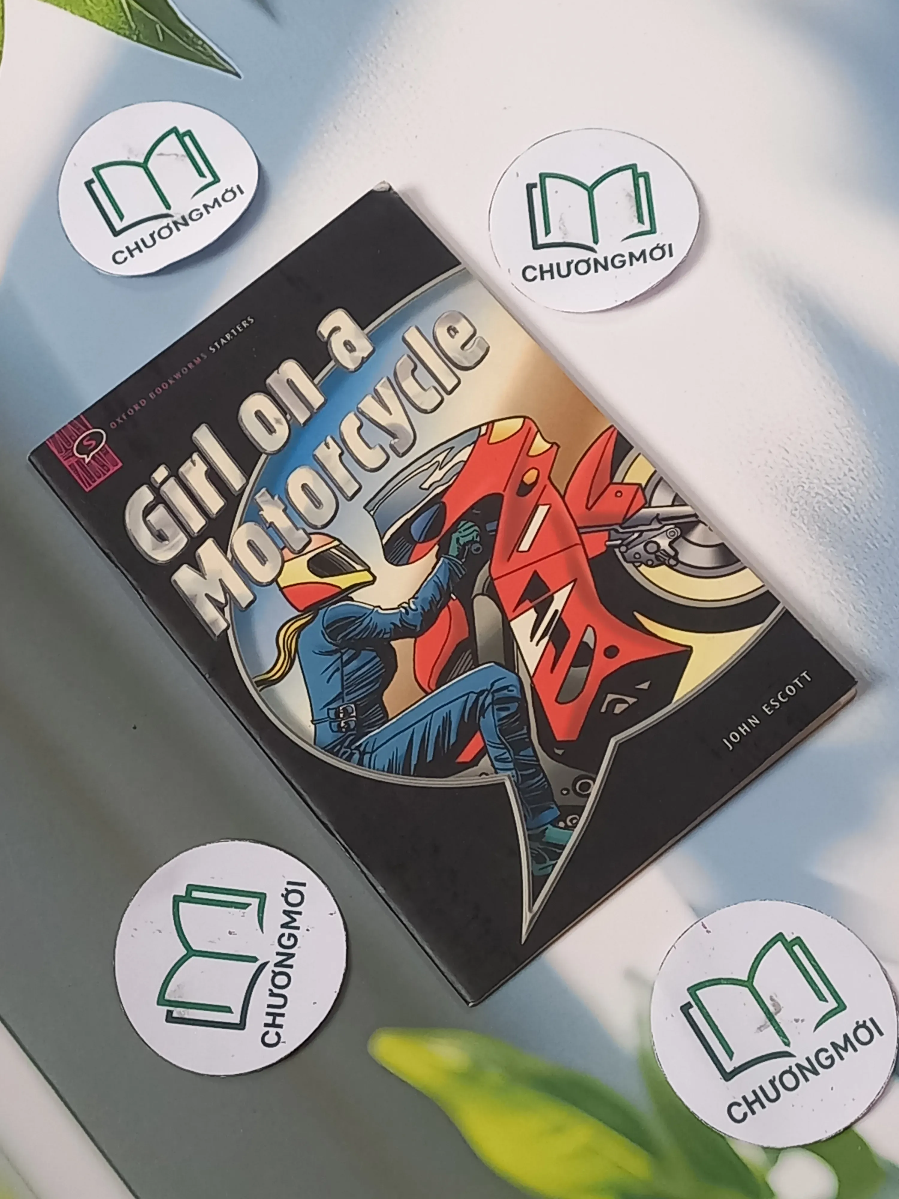 Girl on a Motorcycle  - John Escott 