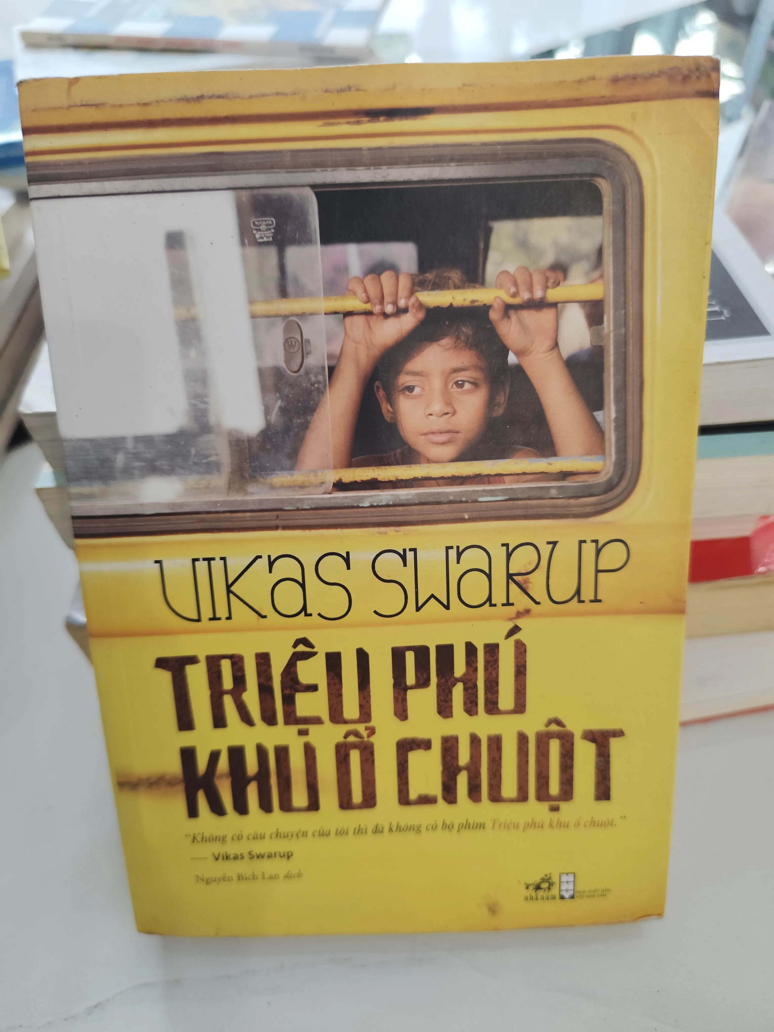 Triệu phú khu ổ chuột UIKAS SWARUP by  - Sách Book Cover - Ngọc Hiển Books