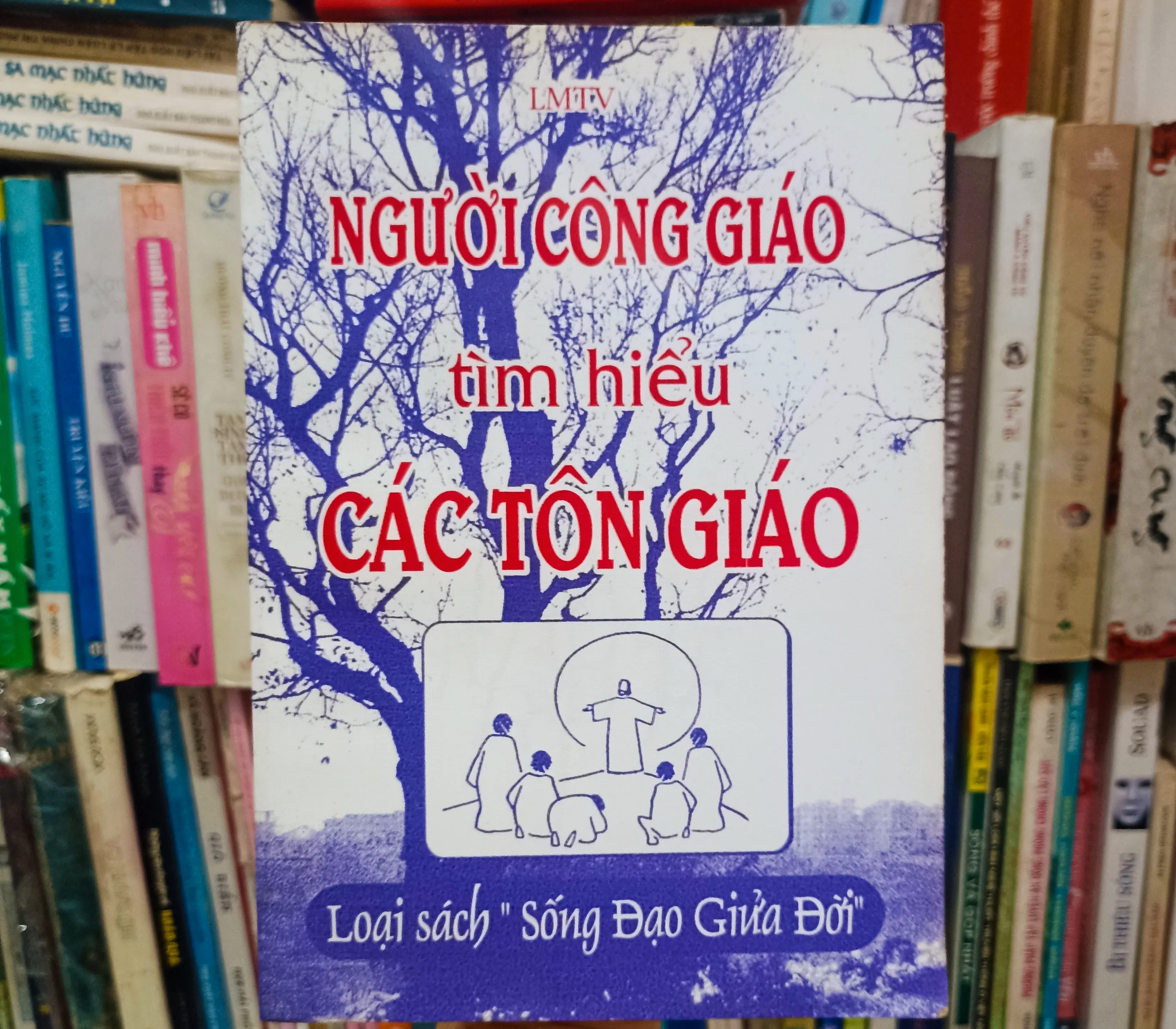 Người Công Giáo tìm hiểu cái tôn giáo 🌻 by  - Sách Book Cover - Ngọc Hiển Books