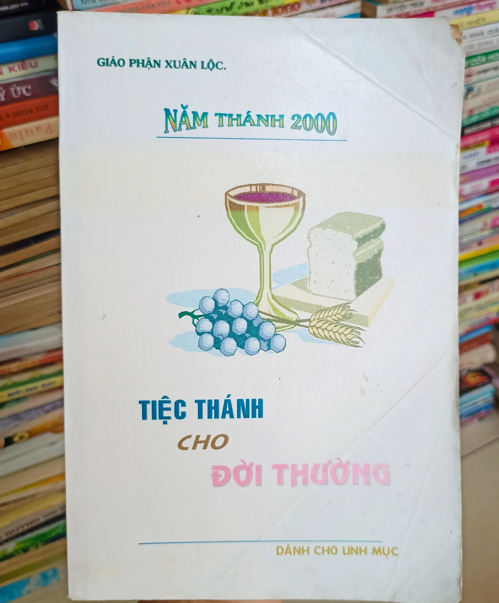 Tiệc thánh cho đời thường 🌻 by  - Sách Book Cover - Ngọc Hiển Books