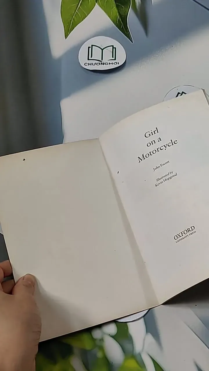 Girl on a Motorcycle  - John Escott  703124