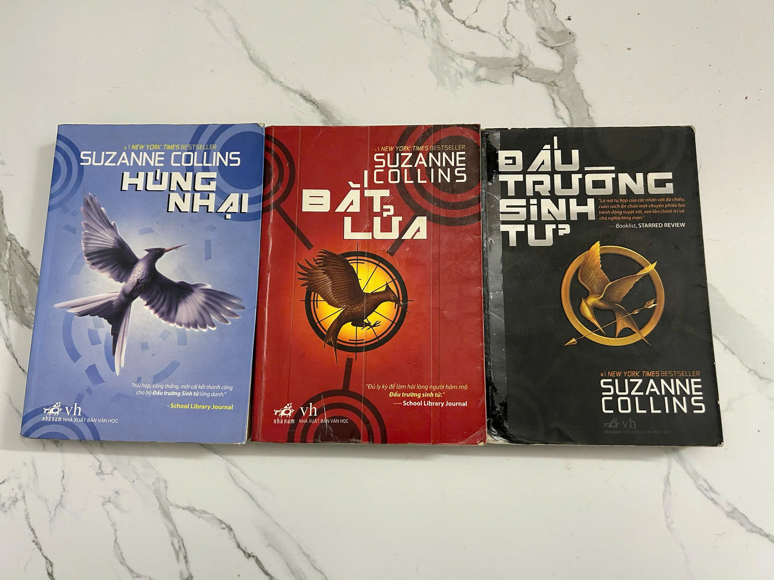 Đấu trường sinh tử (The Hunger Games - Trọn bộ) - Suzanne Collins
